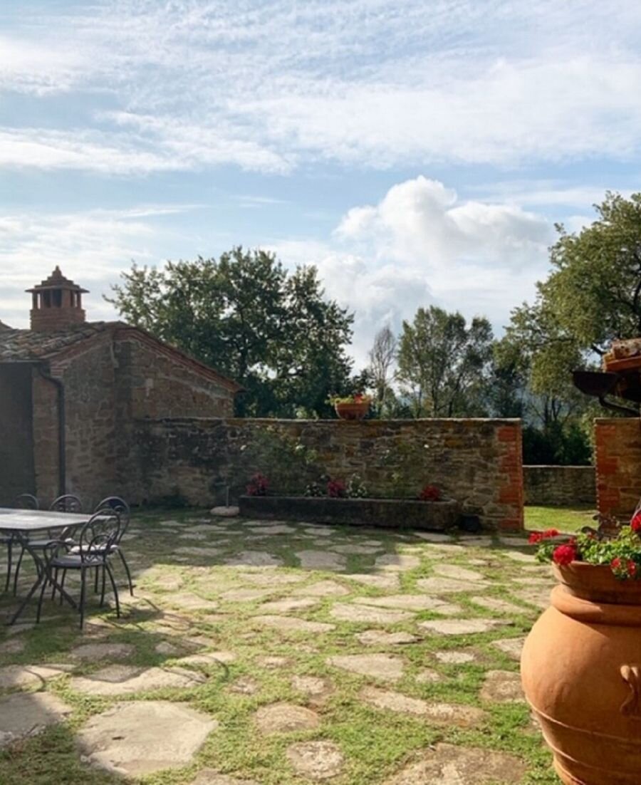 The beautiful relaxing courtyard within our Tuscan Villa property.