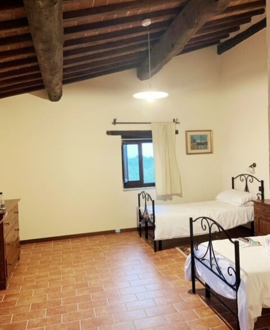 A twin room at our Tuscan Villa.